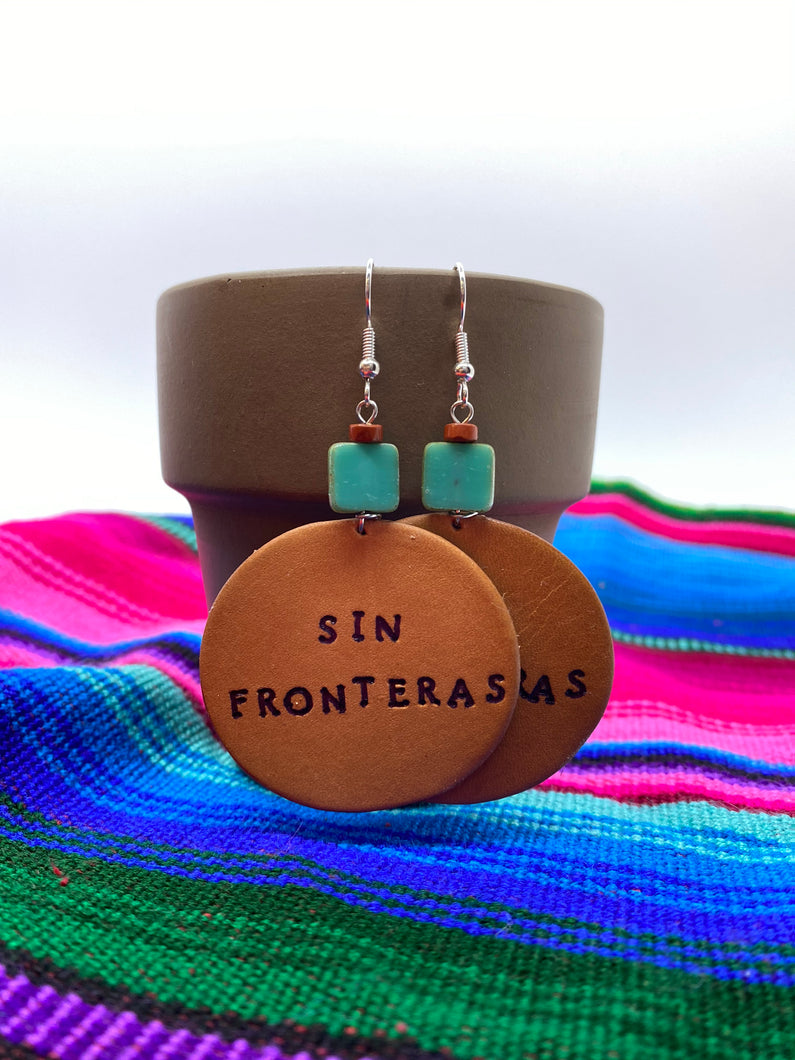 “Sin Fronteras” leather round earrings